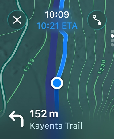 Maps app, navigation instructions appear at bottom of screen