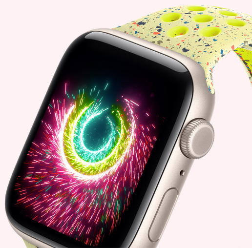 Apple Watch SE 3, aluminum case, starlight color, Activity rings sparking like fireworks, volt splash Nike Sport Band