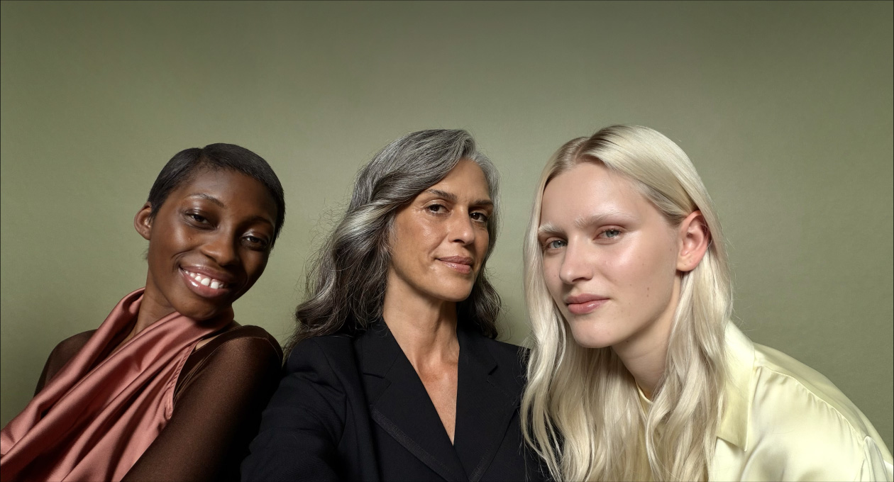 Appen Kamera på iPhone 17 Pro, funktionen Centrerat för bilder demonstrerar en gruppselfie