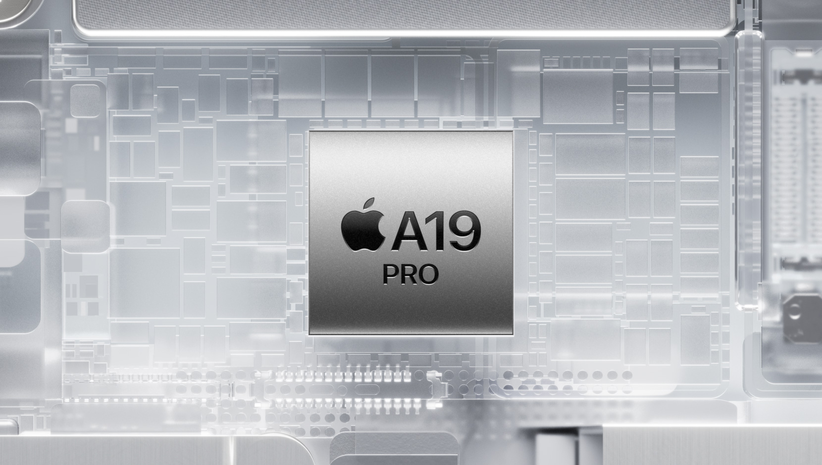 A19 Pro chip surrounded by glowing interior iPhone components